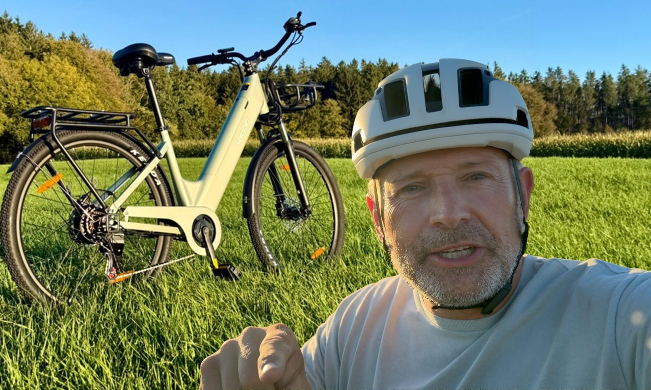 Velopro C1 Pro E-Bike Test – Titelbild mit Heiko und dem Tiefeinsteiger-Rad im Feld